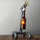 Image for article titled Use These Vintage Beer Bottle Lamps to Make Light of Your Drinking Problem